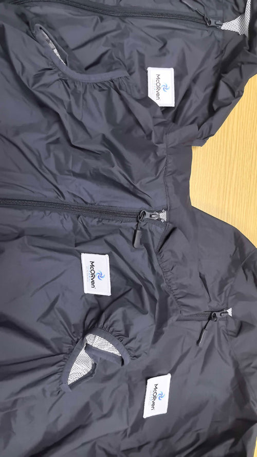 Actual McORven vest showing the zip front and brand label